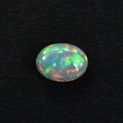 ETHIOPIAN OPAL PLAIN OVAL CAB (WHITE BASE/BLUE GREEN POWER) 8.00X6.00 MM 0.77 CTS