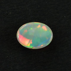 ETHIOPIAN OPAL PLAIN OVAL CAB (WHITE BASE/BLUE GREEN POWER) 8.00X6.00 MM 0.77 CTS