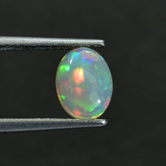 ETHIOPIAN OPAL PLAIN OVAL CAB (WHITE BASE/BLUE GREEN POWER) 8.00X6.00 MM 0.77 CTS