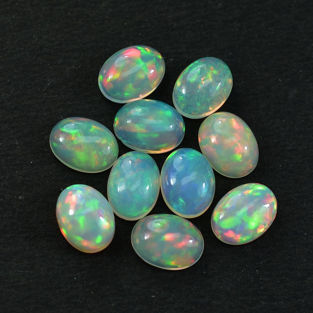 ETHIOPIAN OPAL PLAIN OVAL CAB (WHITE BASE/BLUE GREEN POWER) 8.00X6.00 MM 0.77 CTS