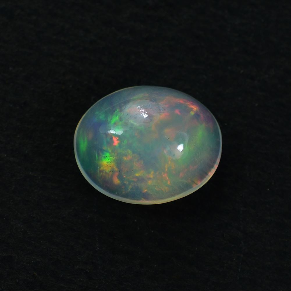 ETHIOPIAN OPAL PLAIN OVAL CAB (WHITE BASE/BLUE GREEN POWER) 10.00X8.00 MM 1.69 CTS