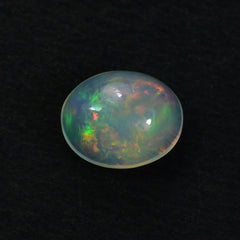 ETHIOPIAN OPAL PLAIN OVAL CAB (WHITE BASE/BLUE GREEN POWER) 10.00X8.00 MM 1.69 CTS