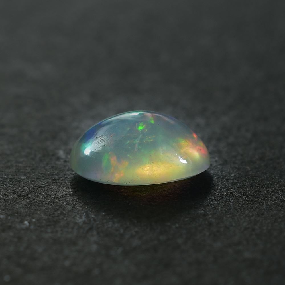 ETHIOPIAN OPAL PLAIN OVAL CAB (WHITE BASE/BLUE GREEN POWER) 10.00X8.00 MM 1.69 CTS