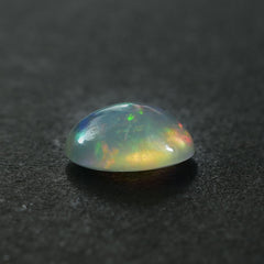 ETHIOPIAN OPAL PLAIN OVAL CAB (WHITE BASE/BLUE GREEN POWER) 10.00X8.00 MM 1.69 CTS