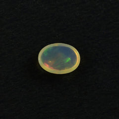 ETHIOPIAN OPAL PLAIN OVAL CAB (YELLOWISH TRANSPARENT/VERY LOW POWER) 7.00X5.00 MM 0.46 CTS