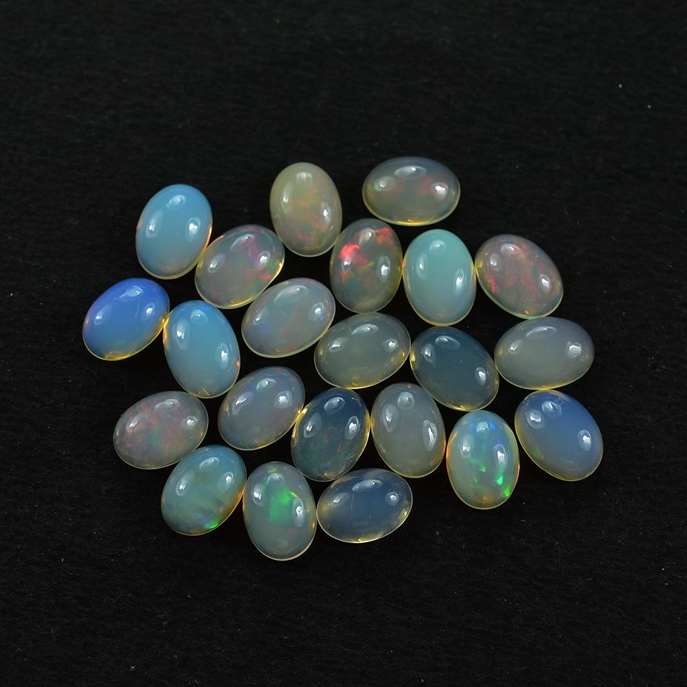 ETHIOPIAN OPAL PLAIN OVAL CAB (YELLOWISH TRANSPARENT/VERY LOW POWER) 7.00X5.00 MM 0.46 CTS