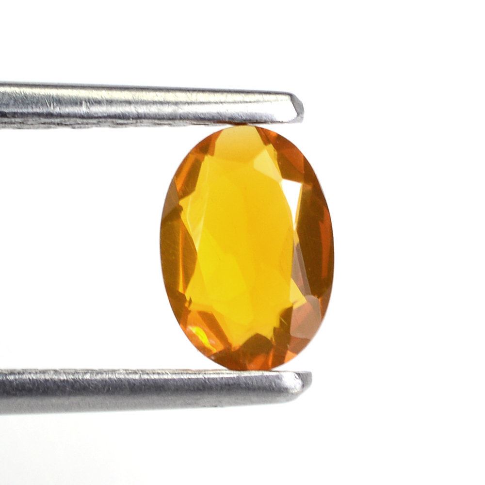 FIRE OPAL CUT OVAL (AMERICAN) 7X5MM 0.56 Cts.