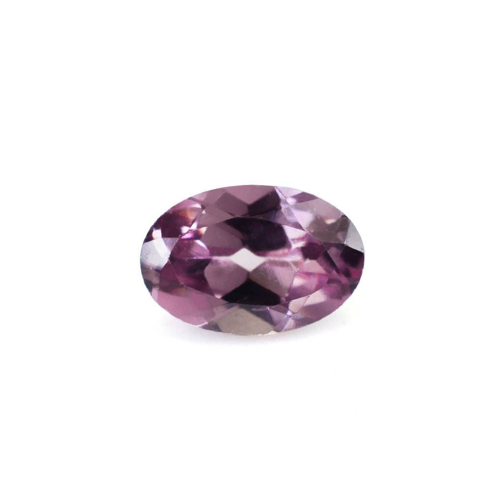 CHAMPAGNE GARNET CUT OVAL 6X4MM 0.54 Cts.