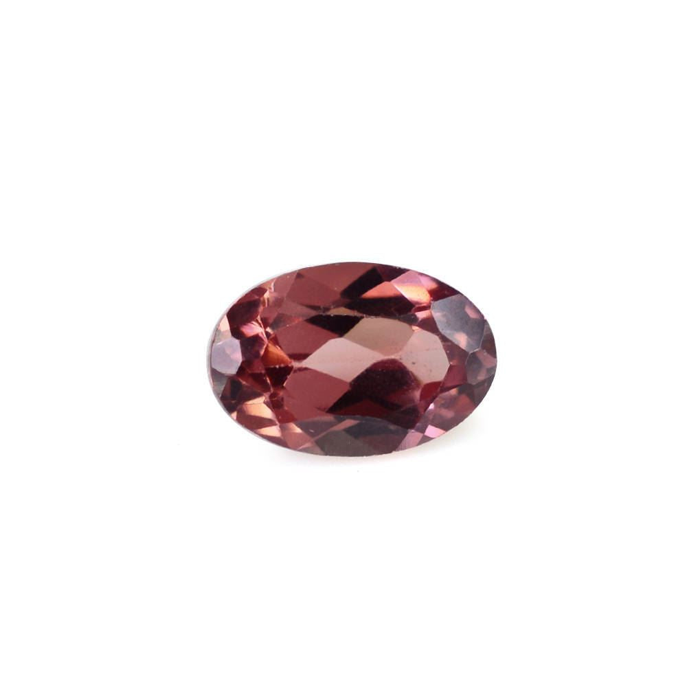 CHAMPAGNE GARNET CUT OVAL 6X4MM 0.59 Cts.