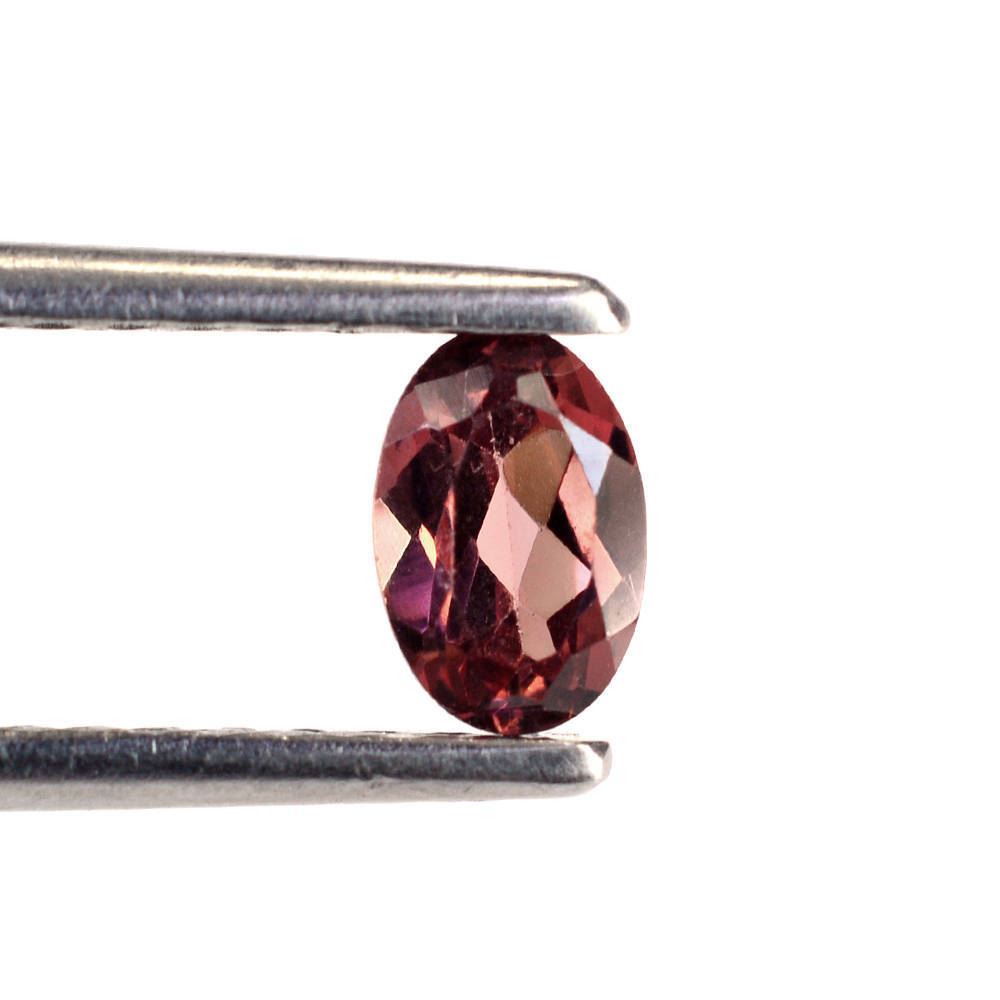 CHAMPAGNE GARNET CUT OVAL 6X4MM 0.59 Cts.