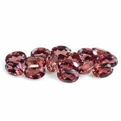 CHAMPAGNE GARNET CUT OVAL 6X4MM 0.59 Cts.