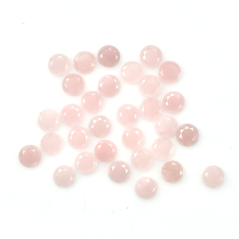 GUAVA QUARTZ TABLE CUT ROUND CAB 6.50MM 0.58 Cts.