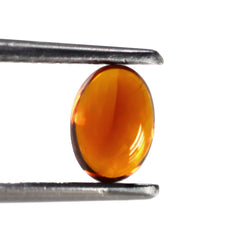 HESSONITE OVAL CAB 7X5MM 0.85 Cts.