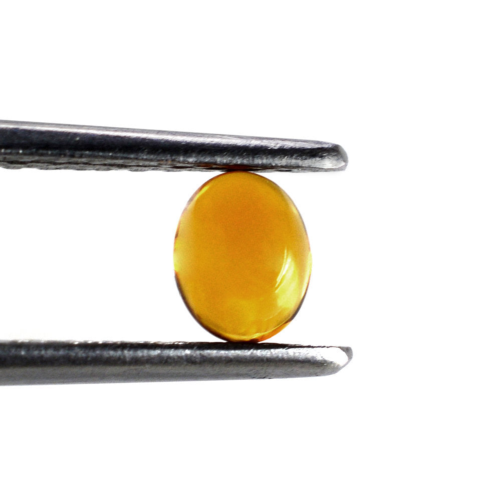 HESSONITE OVAL CAB 5X4MM 0.47 Cts.