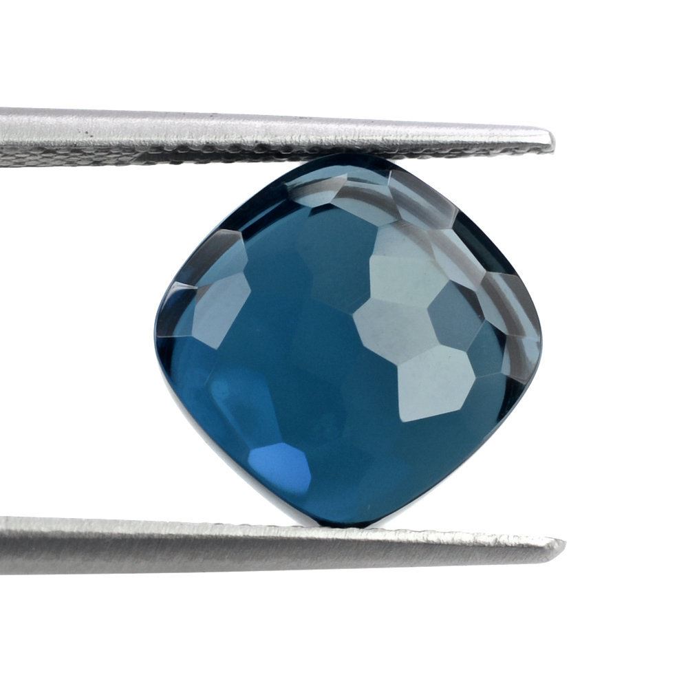 LONDON BLUE TOPAZ IRREGULAR CUT BOTTLE CORK 10.50MM 9.62 Cts.