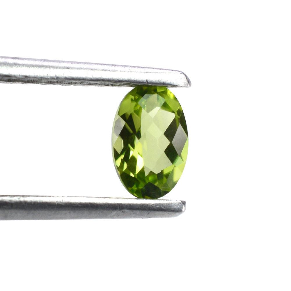 PERIDOT CHECKER CUT OVAL CAB (TOP/CLEAN) 6X4MM 0.48 Cts.