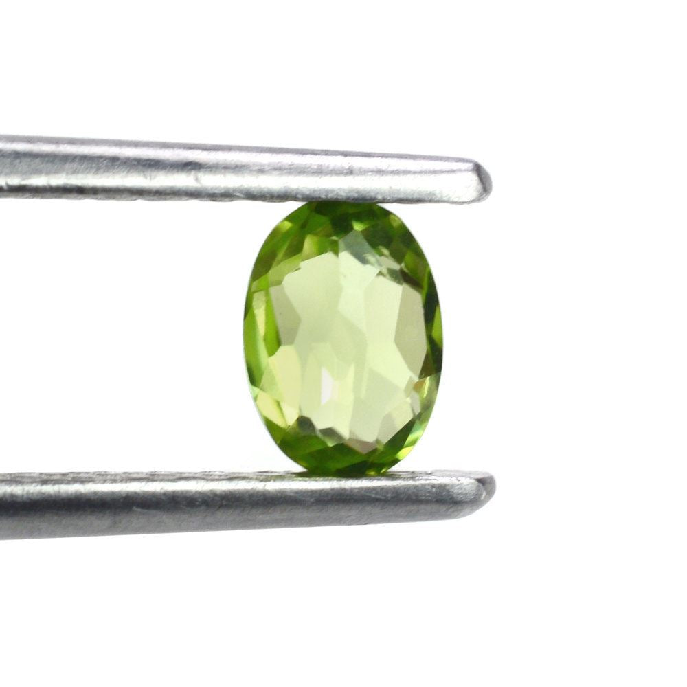 PERIDOT IRREGULAR CUT BRIOLETTE OVAL (TOP) 6X4MM 0.50 Cts.