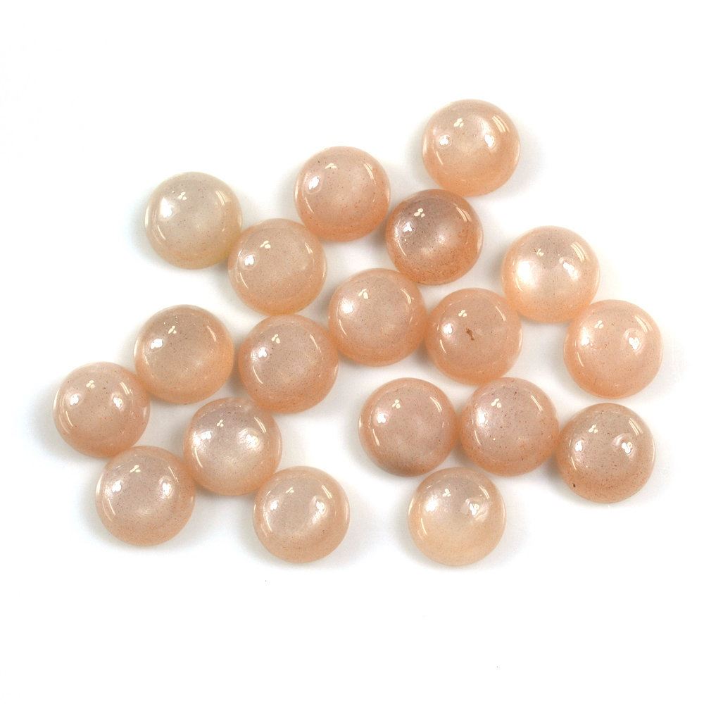 PEACH MOONSTONE ROUND CAB 6MM 0.78 Cts.