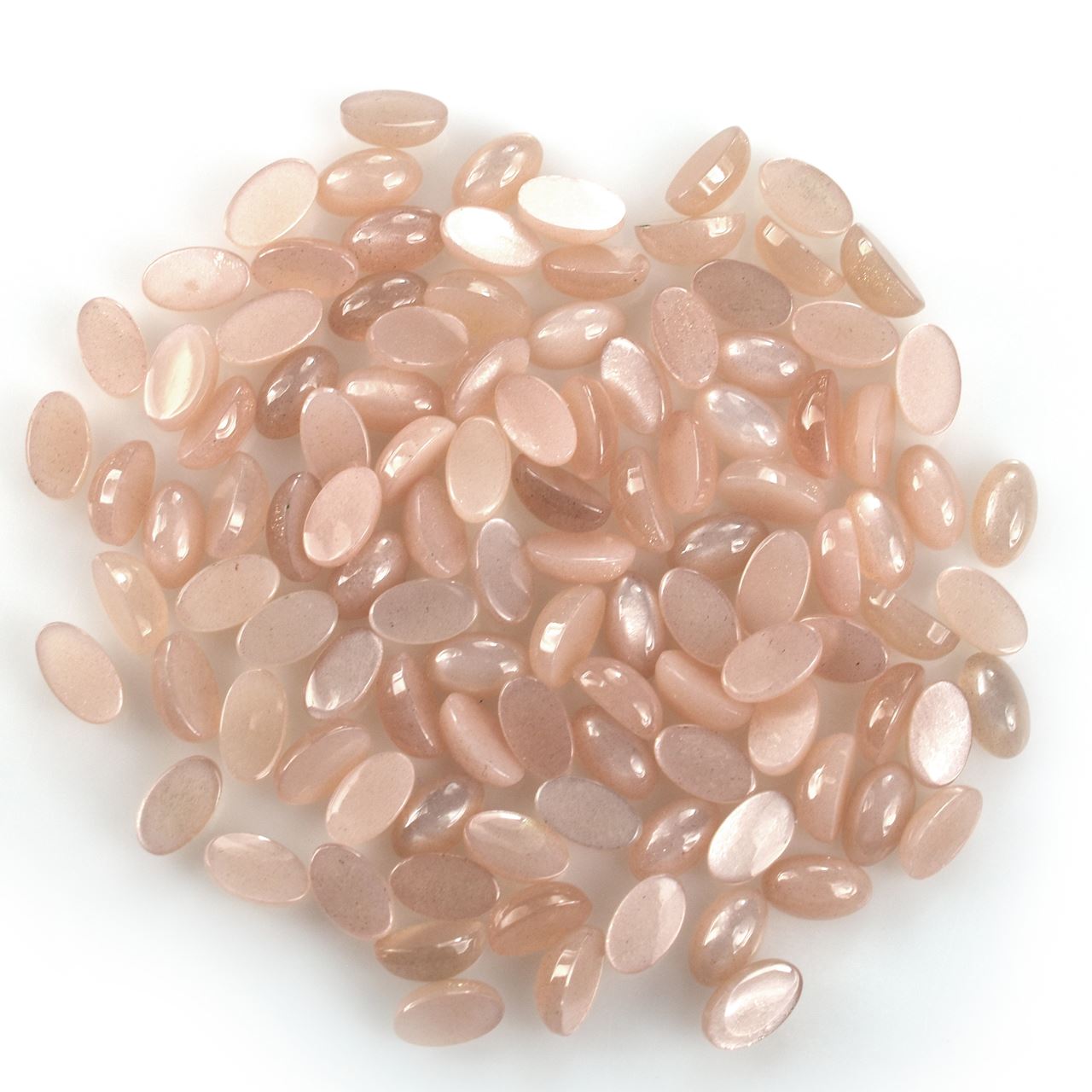 PEACH MOONSTONE PLAIN OVAL CAB (MEDIUM)(CLEAN) 7.00X4.00 MM 0.58 Cts.