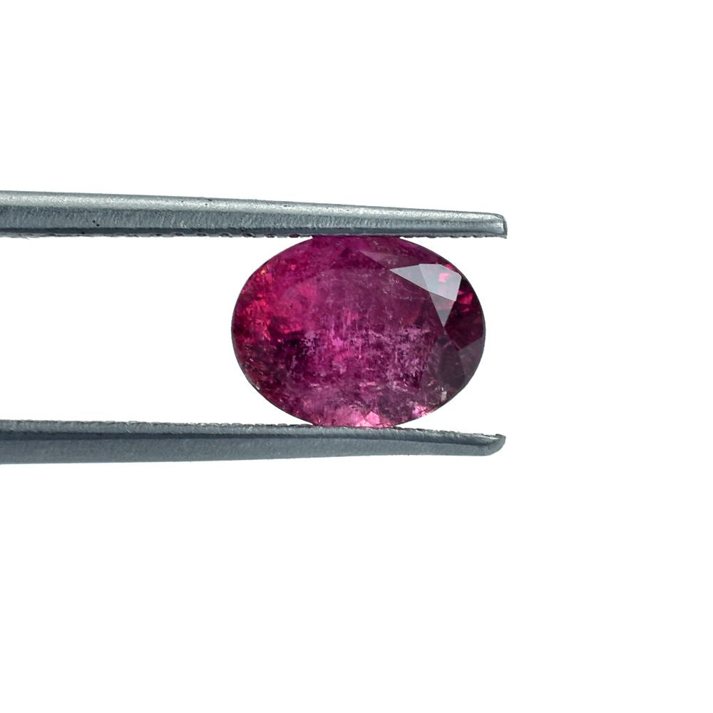 PINK TOURMALINE (VERY MILKY)(HI) WITH CRACKS CUT OVAL 9.00X7.00 MM 1.81 Cts.
