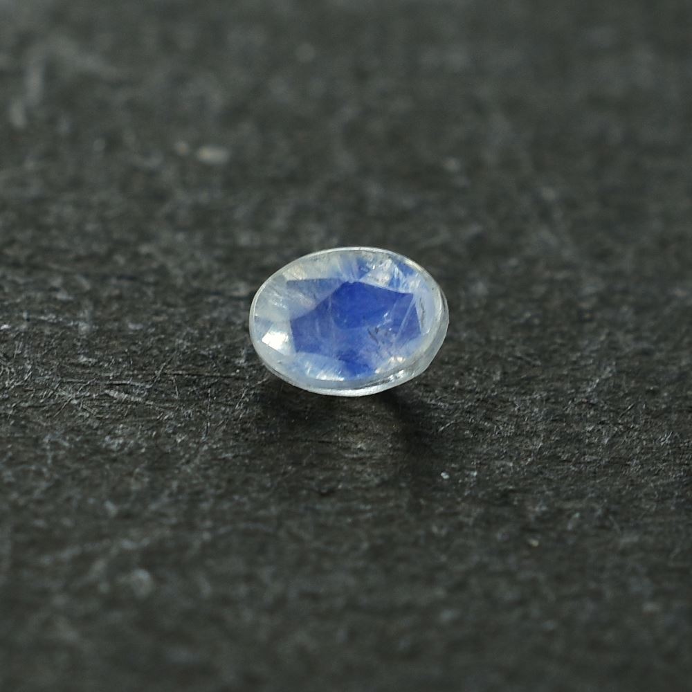 RAINBOW MOONSTONE PLAIN OVAL CAB (WHITE)(CLOUDY) 3.50X2.50 MM 0.12 Cts.