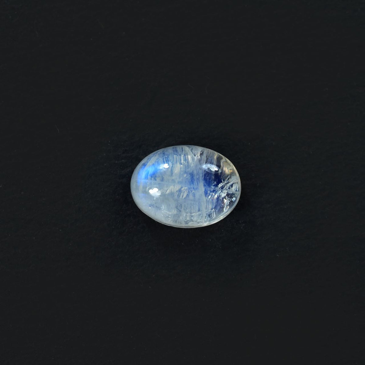 RAINBOW MOONSTONE PLAIN OVAL CAB (CLOUDY)(NICE BLUE SHINE) 8.00X6.00 MM 1.38 Cts.