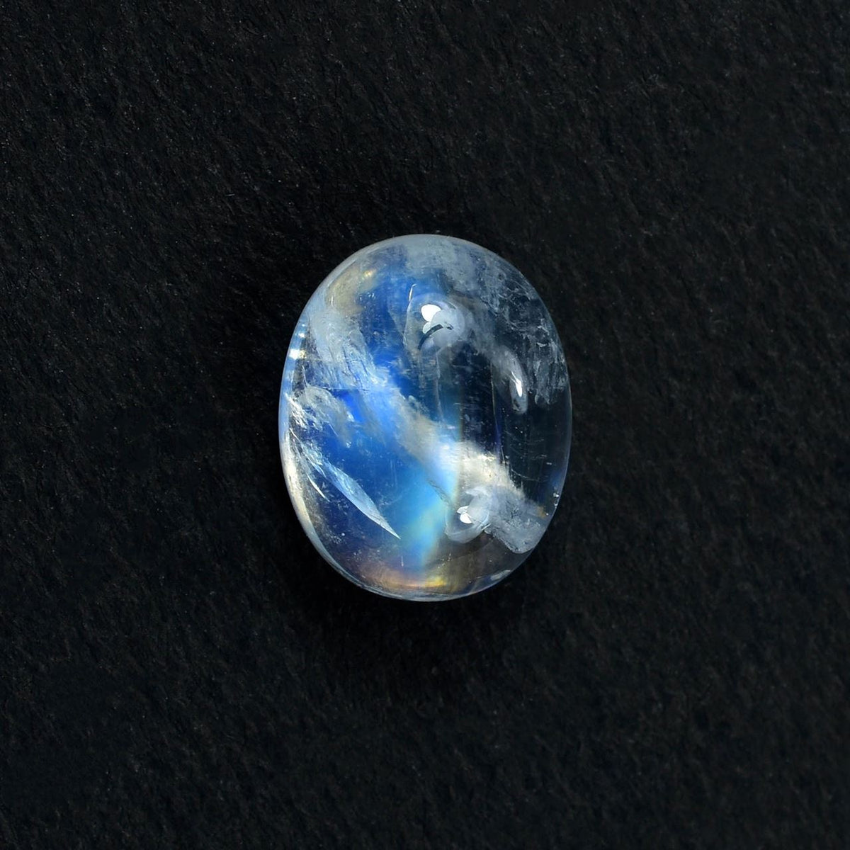 RAINBOW MOONSTONE PLAIN OVAL CAB (SEMI CLOUDY)(BLUE GREEN POWER) 10.00X8.00 MM 2.78 Cts.