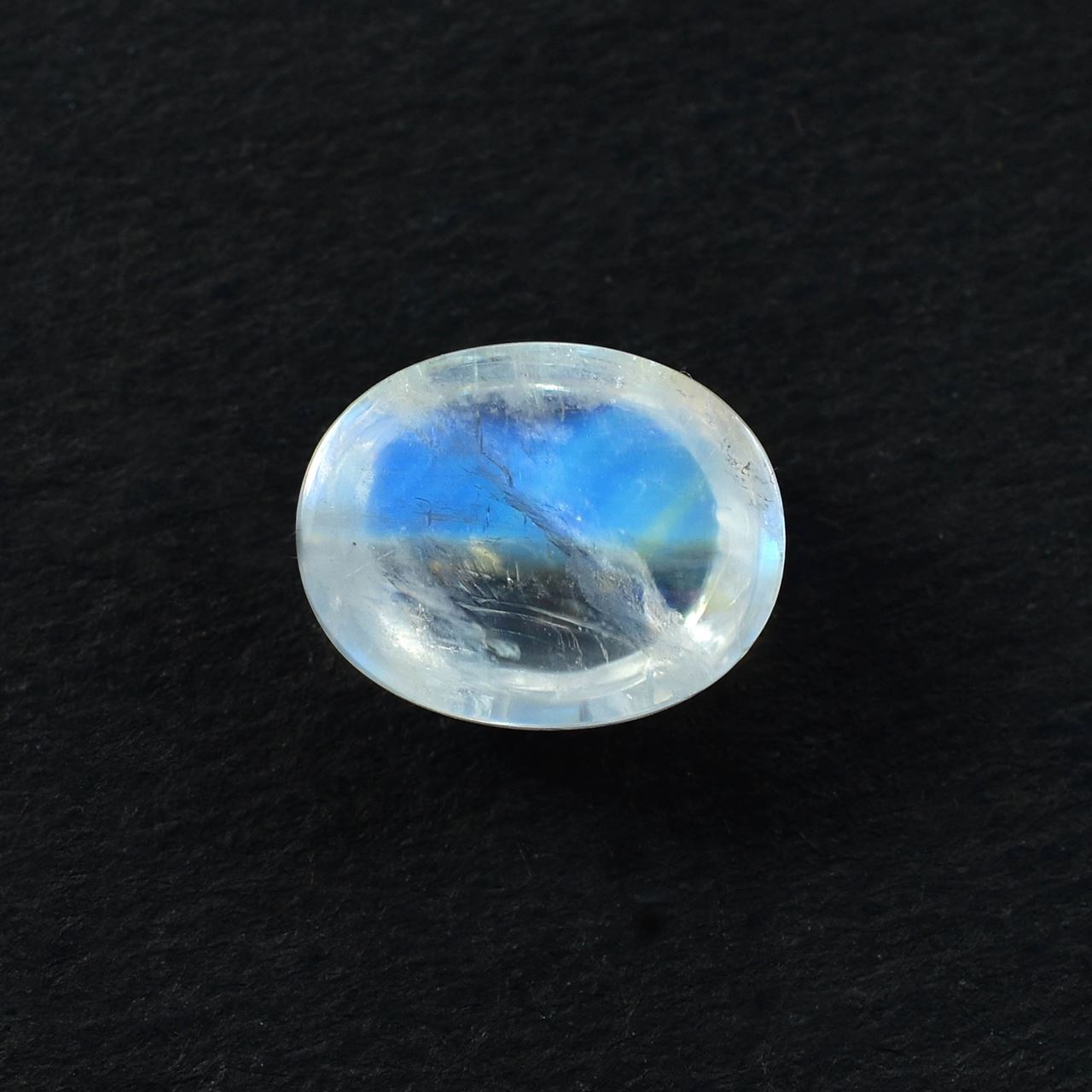 RAINBOW MOONSTONE PLAIN OVAL CAB (SEMI CLOUDY)(BLUE GREEN POWER) 10.00X8.00 MM 2.78 Cts.