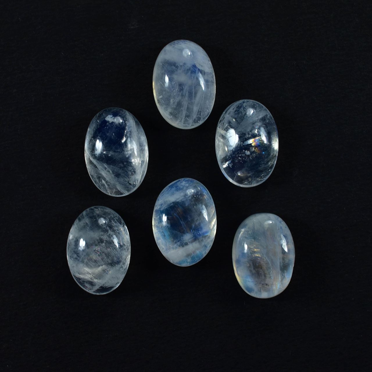 RAINBOW MOONSTONE PLAIN OVAL CAB (SEMI CLOUDY)(SI) 14.00X10.00 MM 6.10 Cts.