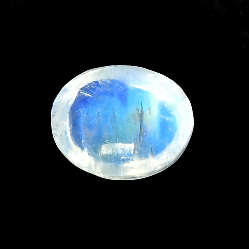 RAINBOW MOONSTONE PLAIN OVAL CAB (SEMI CLOUDY)(SI) 5.00X4.00 MM 0.47 Cts.