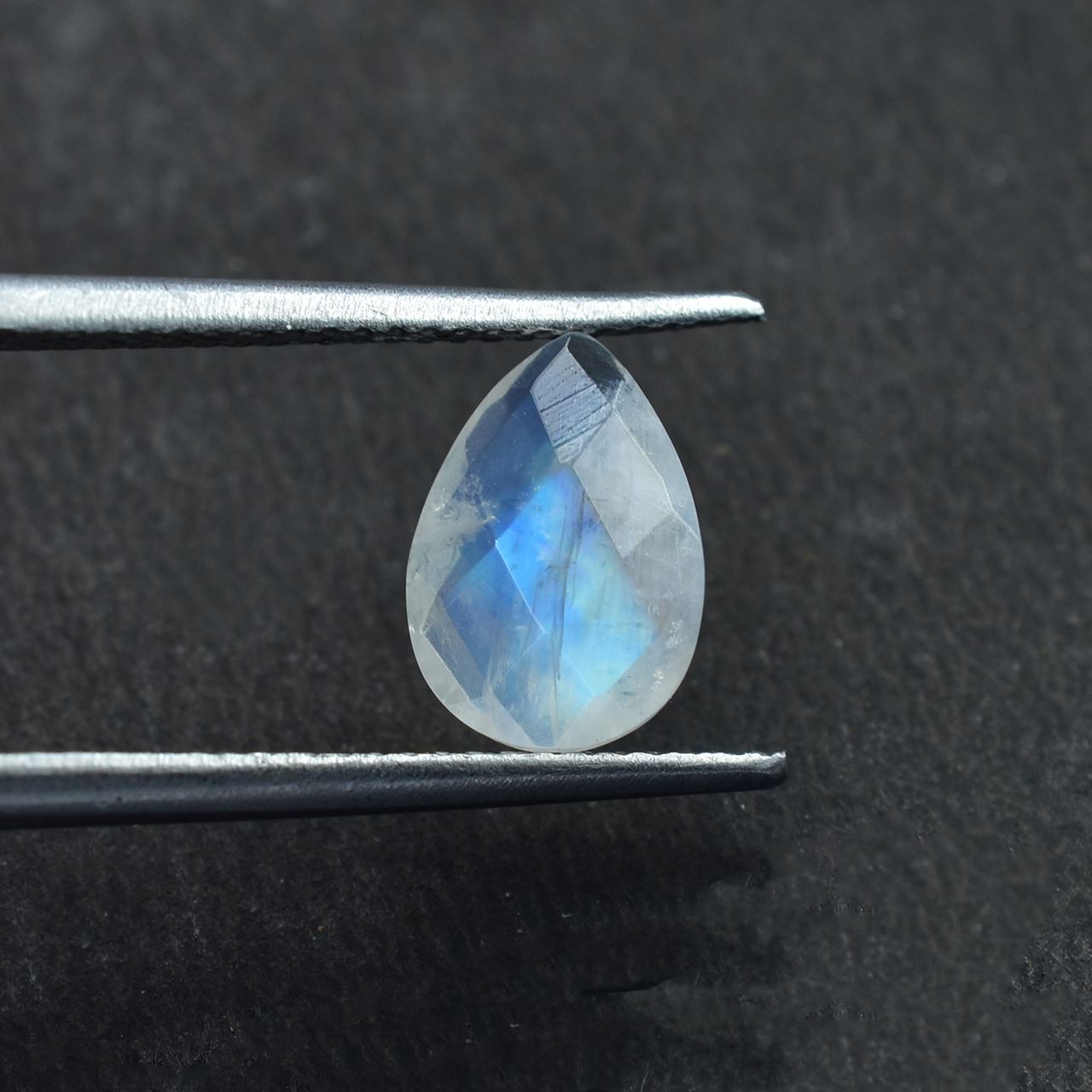 RAINBOW MOONSTONE CHECKER BRIOLETTE PEAR (SEMI CLOUDY)( NICE BLUE SHINE) 10.00X7.00 MM 1.61 Cts.