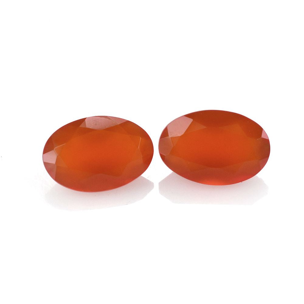 RED ONYX CUT OVAL 6X4MM 0.38 Cts.