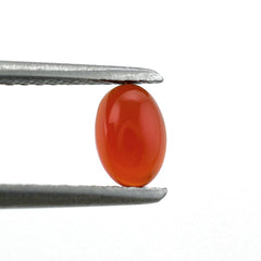 RED ONYX OVAL CAB 6X4MM 0.46 Cts.