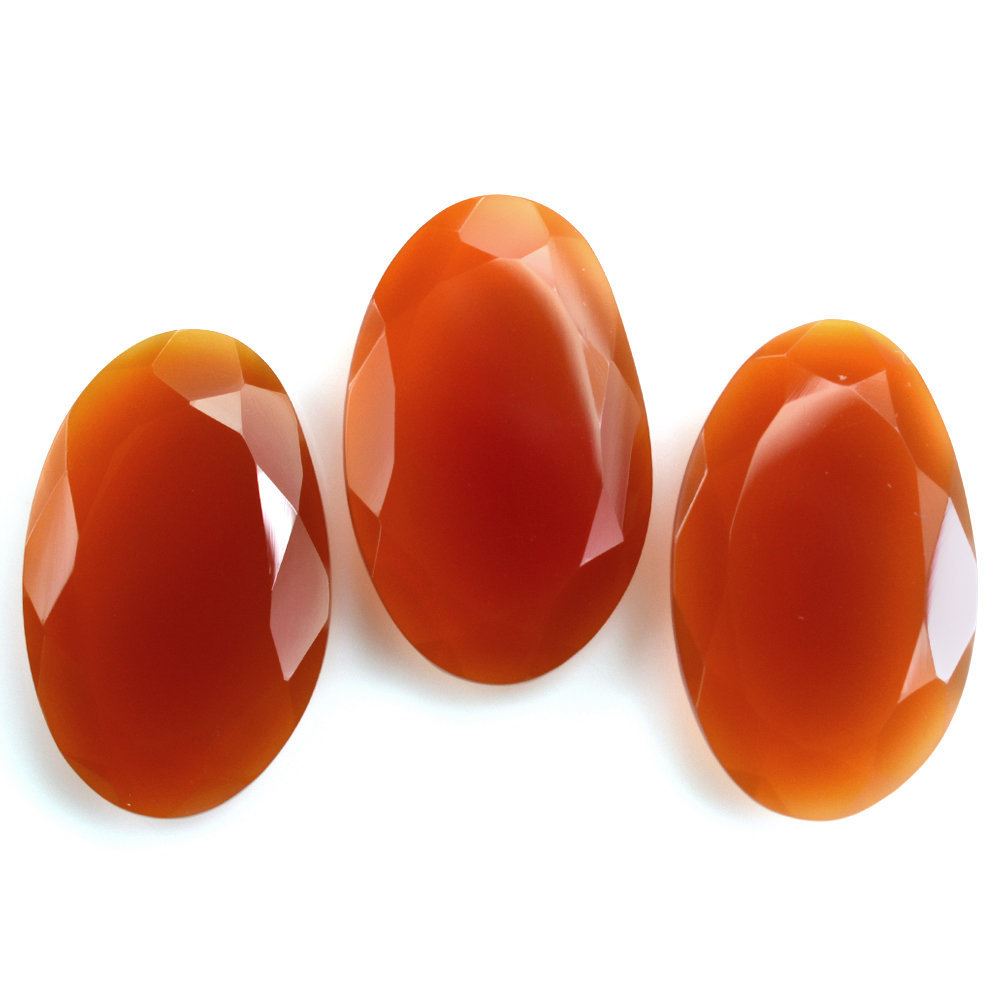 RED ONYX STEP CUT IRREGULAR OVAL 22X14MM 9.09 Cts.