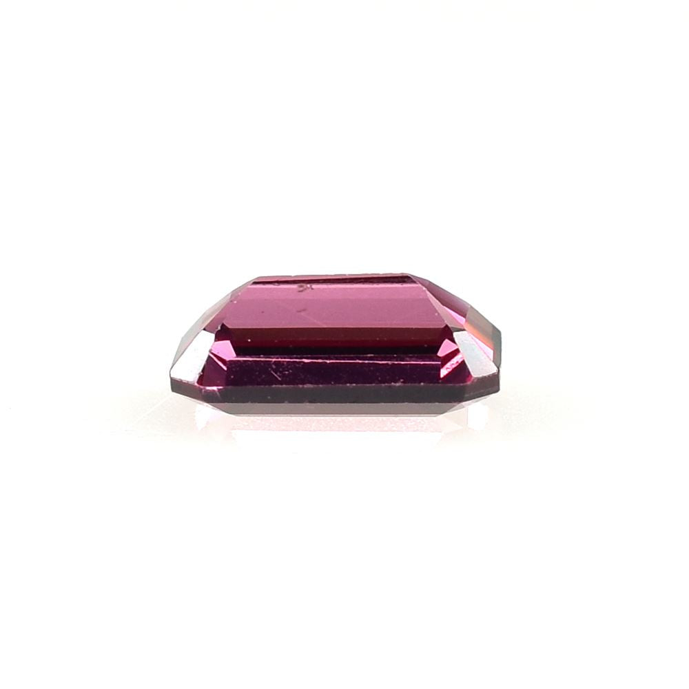 RHODOLITE STEP CUT OCTAGON (REDISH PURPLE DARK)(CLEAN) 6.00X4.00 MM 0.75 Cts.