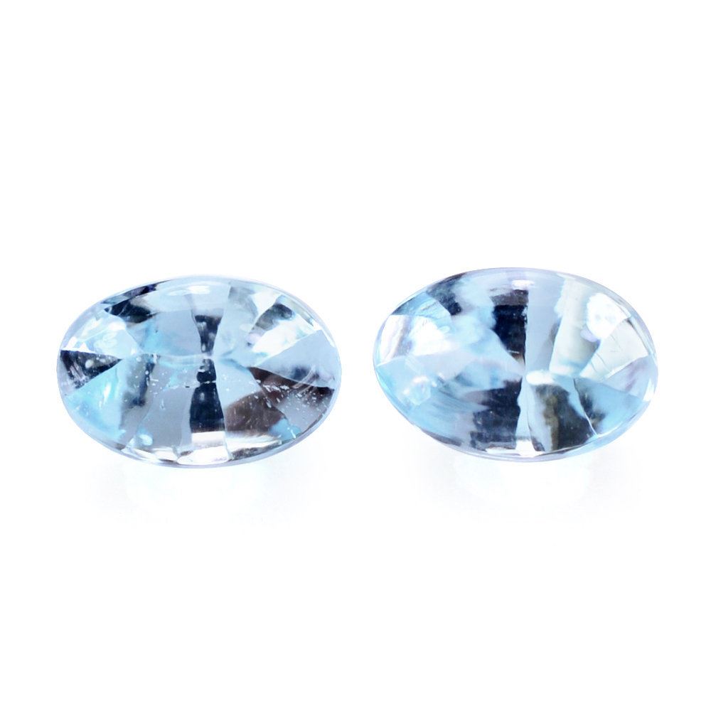 SKY BLUE TOPAZ BUFFTOP OVAL WITH TWISTED CONCAVE BACK (DES#31) 6X4MM 0.68 Cts.