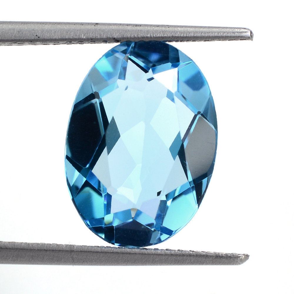 SWISS BLUE TOPAZ CUT OVAL 14X10MM 6.15 Cts.