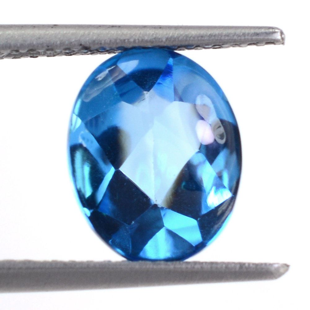 SWISS BLUE TOPAZ BUFFTOP OVAL 10X8MM 2.87 Cts.