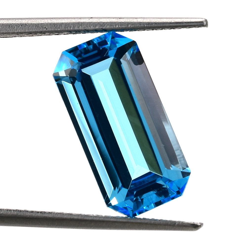 SWISS BLUE TOPAZ STEP CUT OCTAGON (BLUE/CLEAN) 16X8MM 9.40 Cts.