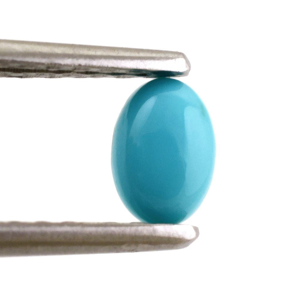 TURQUOISE OVAL CAB 6X4MM 0.39 Cts.