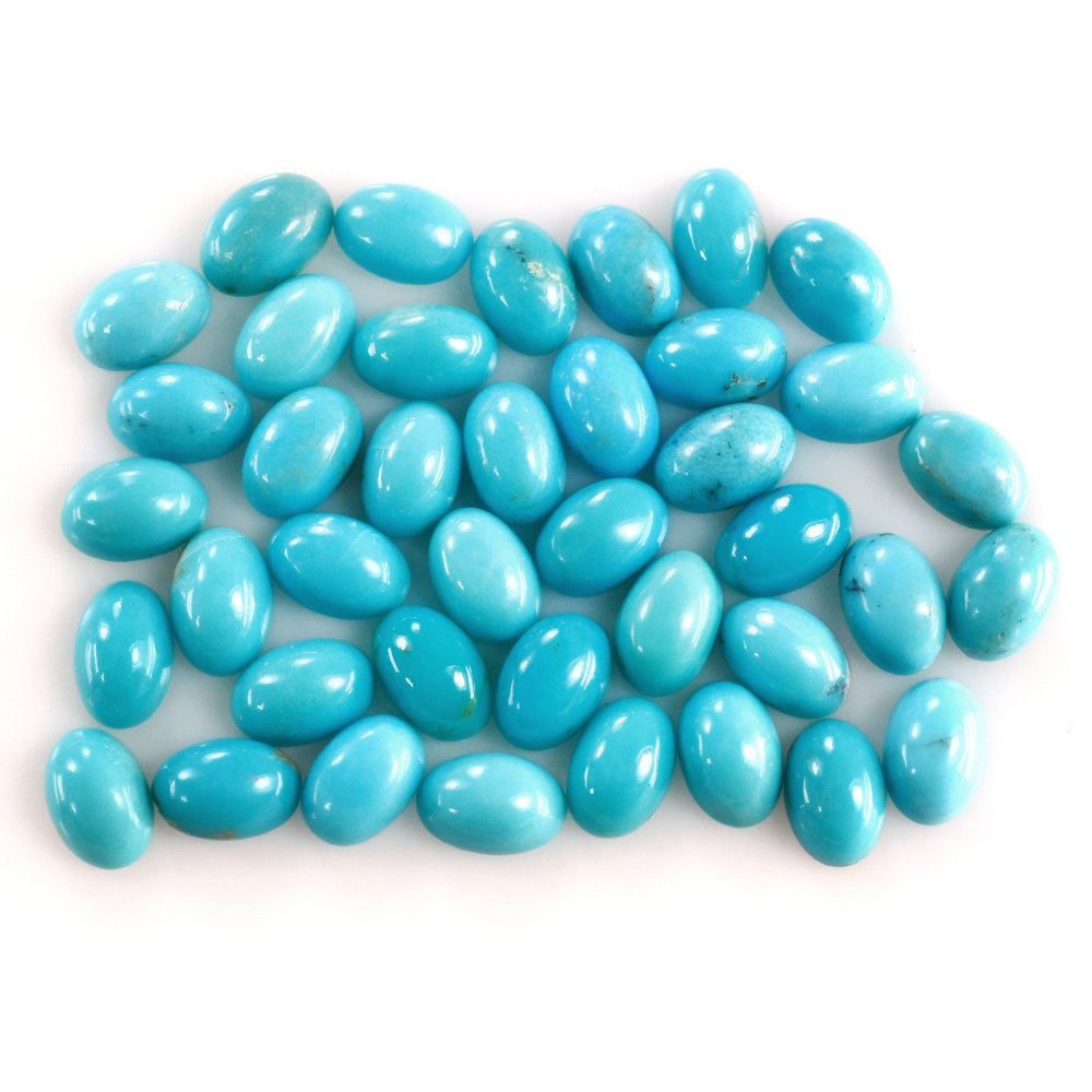 MEXICAN TURQUOISE OVAL CAB (MATRIX) 6X4MM 0.41 Cts.