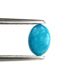 BLUE TURQUOISE OVAL CAB (WITH MATRIX PYRITE) 7X5MM 0.68 Cts.