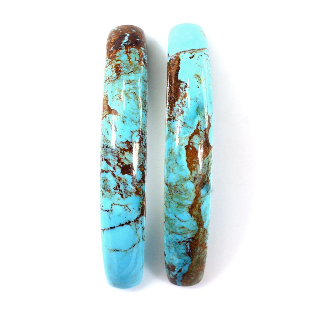 MEXICAN TURQUOISE HALF MOON FANCY CAB (WITH BROWN MATRIX) 61.40X11MM 28.59 Cts.
