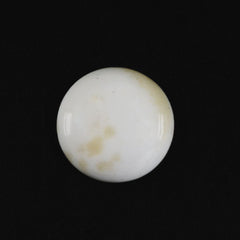 WHITE ONYX ROUND CAB (WITH BROWN SPOTS) 6MM 0.54 Cts.